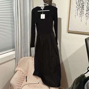 Long sleeved black dress with pockets